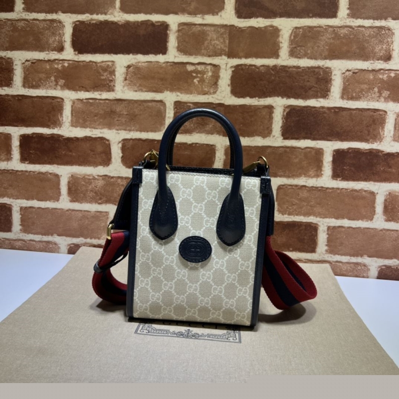 G*u*i top handle bags